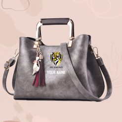 AFL - True fans of Richmond Football Club's Hand Bag:afl,hand bag, leather hanbag, afl jersey