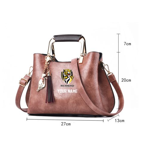 AFL - True fans of Richmond Football Club's Hand Bag:afl,hand bag, leather hanbag, afl jersey