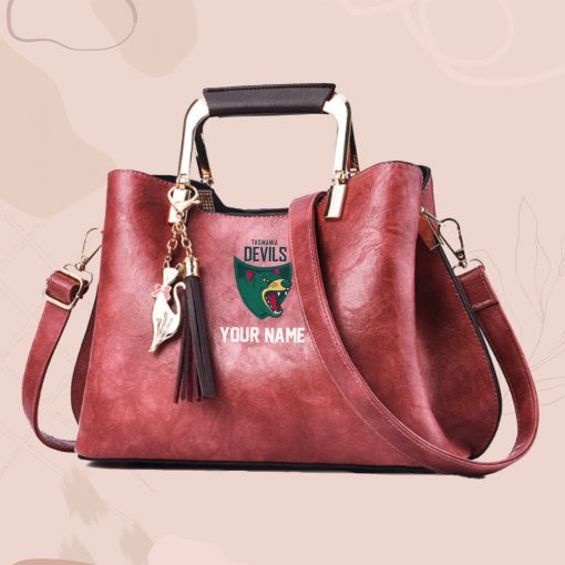 AFL - True fans of Tasmania Devils's Hand Bag:afl,hand bag, leather hanbag, afl jersey